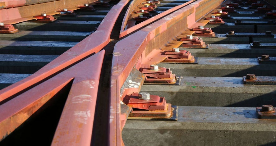 Red railroad tracks crisscrossing