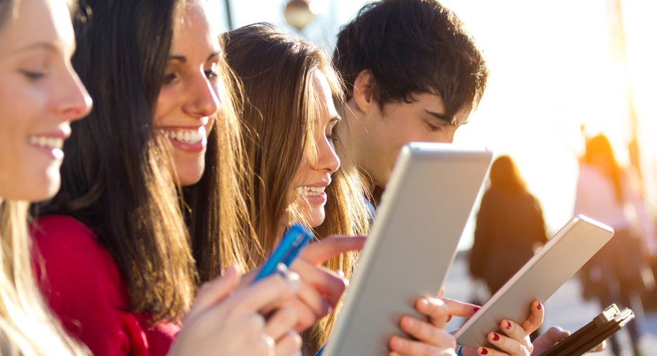 University students using digital devices